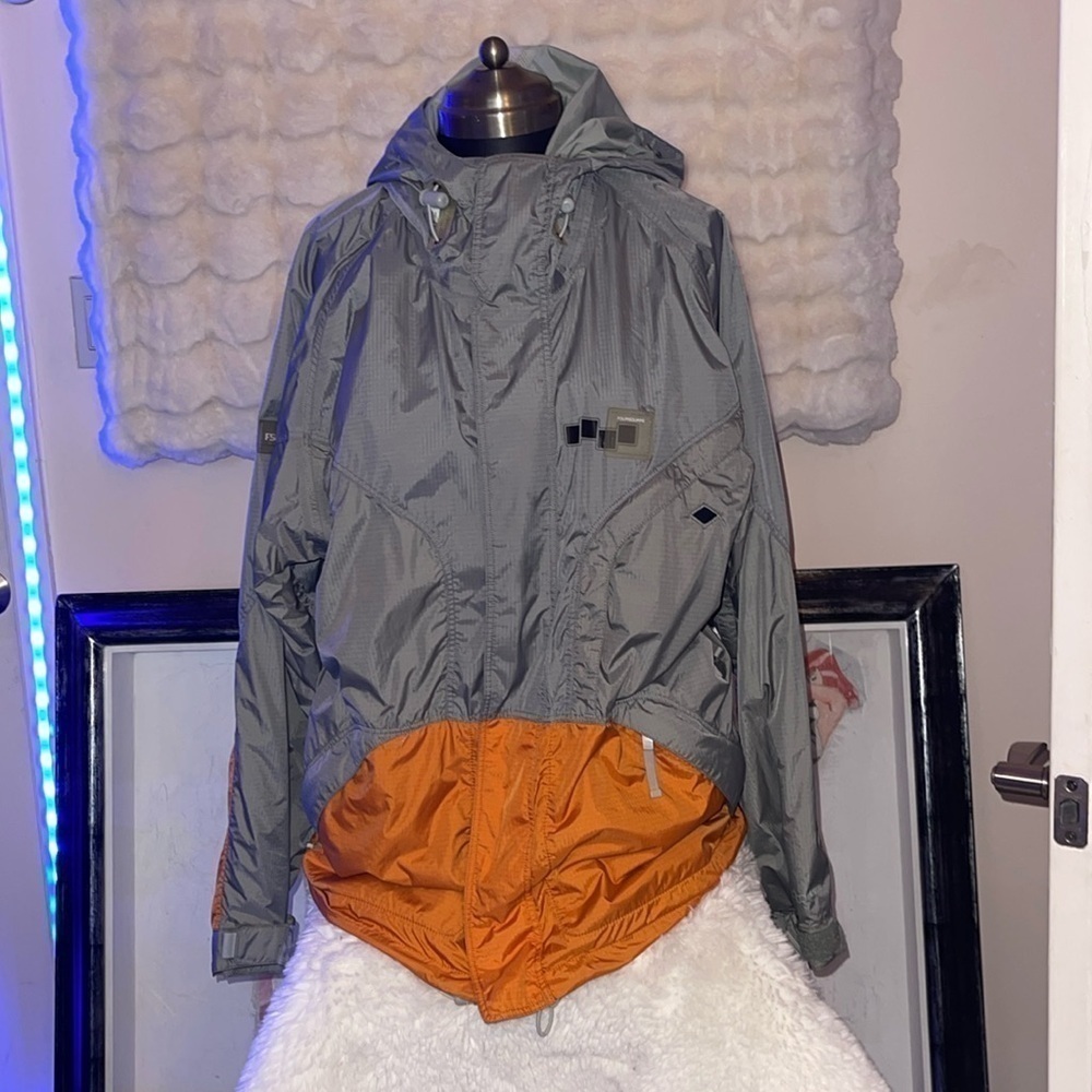 Foursquare mens snowboarding windbreaker jacket grey ish and orange in color